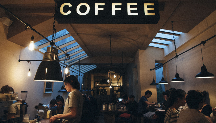 Unitron: Many people in a cafe